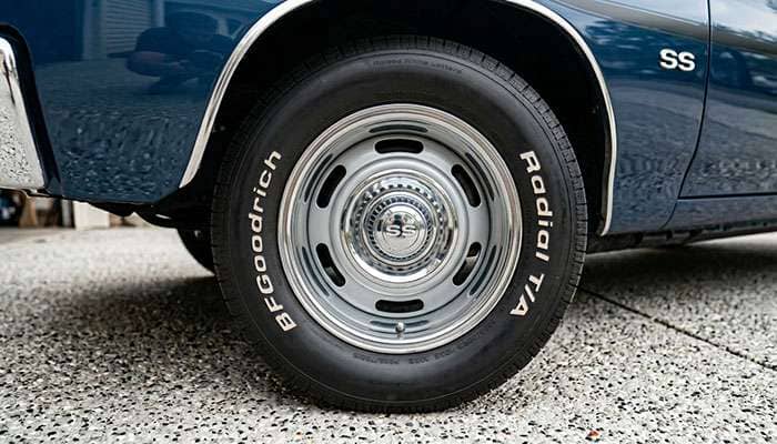 Classic muscle car with 15 inch rally wheels and BFGoodrich Radial T/A tires showing period-correct proportions