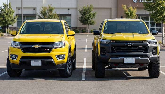 Front view of two yellow 2023 Chevy Colorado trucks, Z71 on left and Trail Boss on right, parked side by side