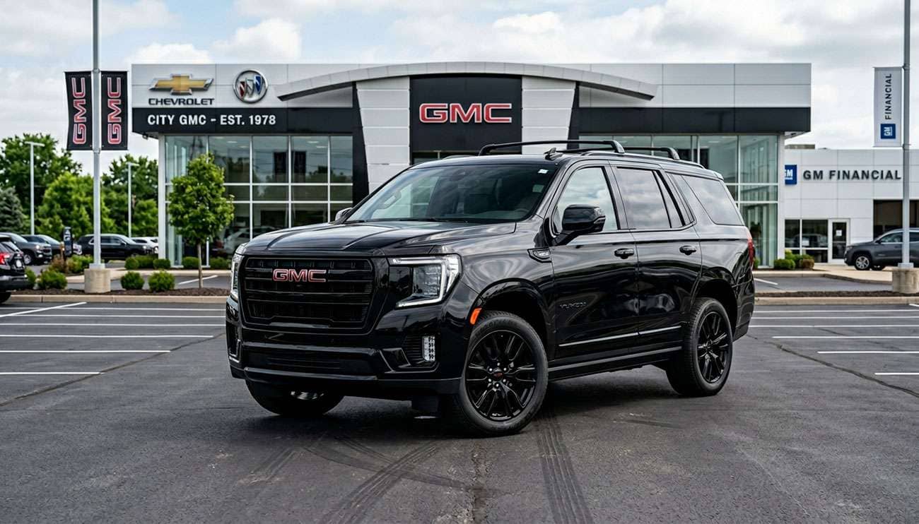 Black 2026 GMC Yukon Elevation SUV parked in front of West Herr dealership with Buick and Cadillac logos visible.