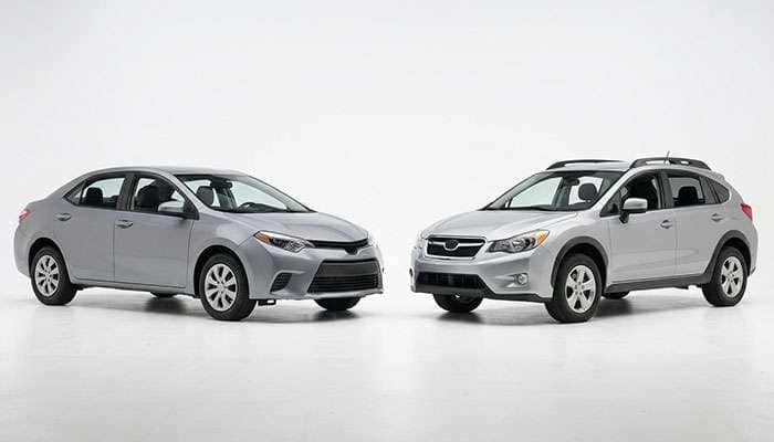 Midsize sedan and compact crossover parked together, both fitted with 205/60R16 tires