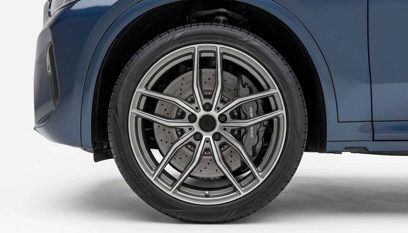 21 inch wheel with a low profile tire mounted on a luxury performance SUV