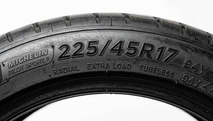 Close-up of a tire sidewall showing the 225/45R17 size markings