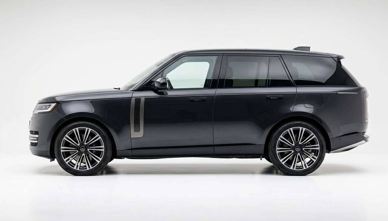 Full-size SUV fitted with 22x9 wheels and low-profile tires shown in complete side profile