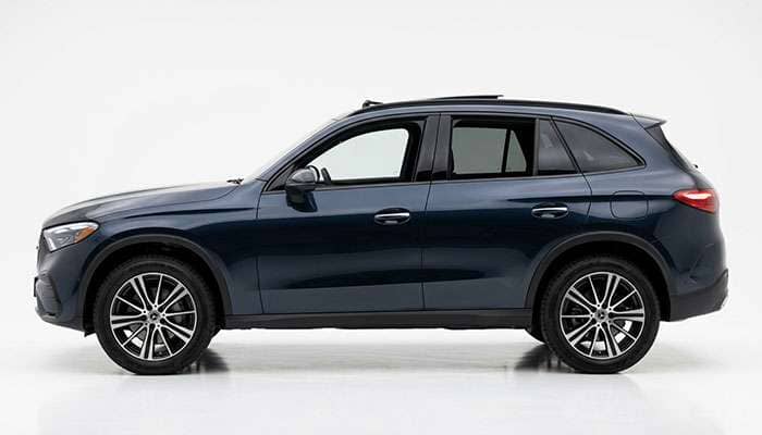 Compact luxury crossover shown in profile on 235/55R19 tires fitted to nineteen-inch alloy wheels