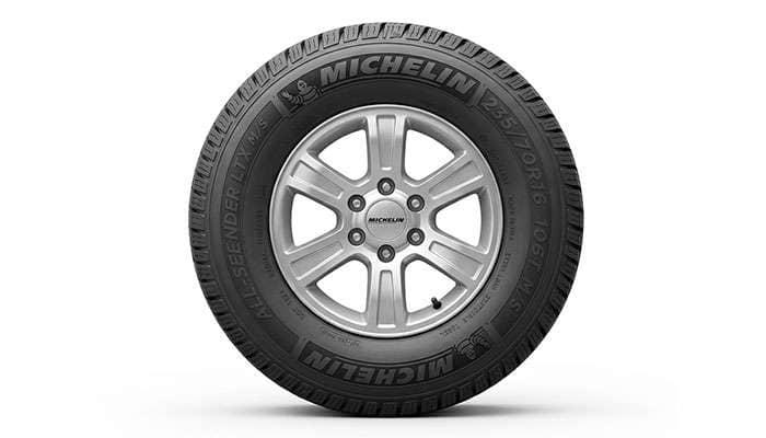 Side profile of a 235/70R16 tire on a sixteen inch wheel with measurement callouts for section width sidewall height and overall diameter