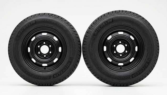 Side profile of a 225/75R15 and a 235/75R15 tire showing the taller sidewall and wider tread of the 235