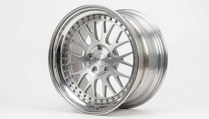 Three piece forged 28 inch wheel showing the center face outer lip and assembly hardware