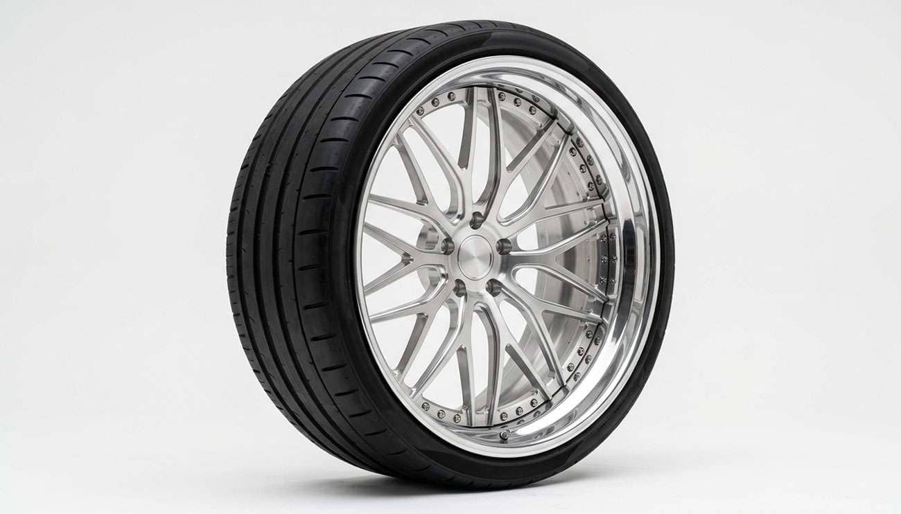 Large diameter 28 inch forged custom wheel with a low profile tire mounted