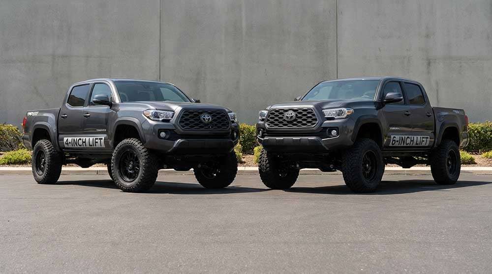 Side-by-side comparison of a 4-inch vs 6-inch vehicle lift both fitted with 35-inch tires showing height differences