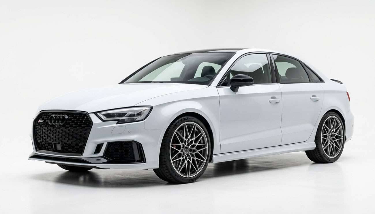 Modern European performance sedan with multi-spoke alloy wheels on a clean white studio background