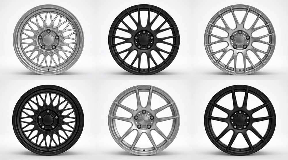 Various 5x120 bolt pattern car wheels displayed showing different styles and finishes
