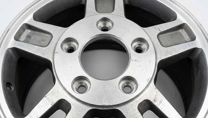 Close-up of a 5x150 wheel mounting face showing the center bore and conical lug seat detail