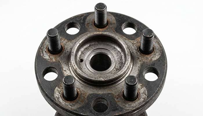 Close-up of a five-lug wheel hub showing the 5x5 bolt pattern