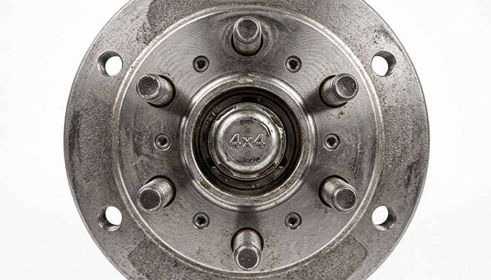 Close-up of a six-lug wheel hub showing the 6x114.3 bolt pattern