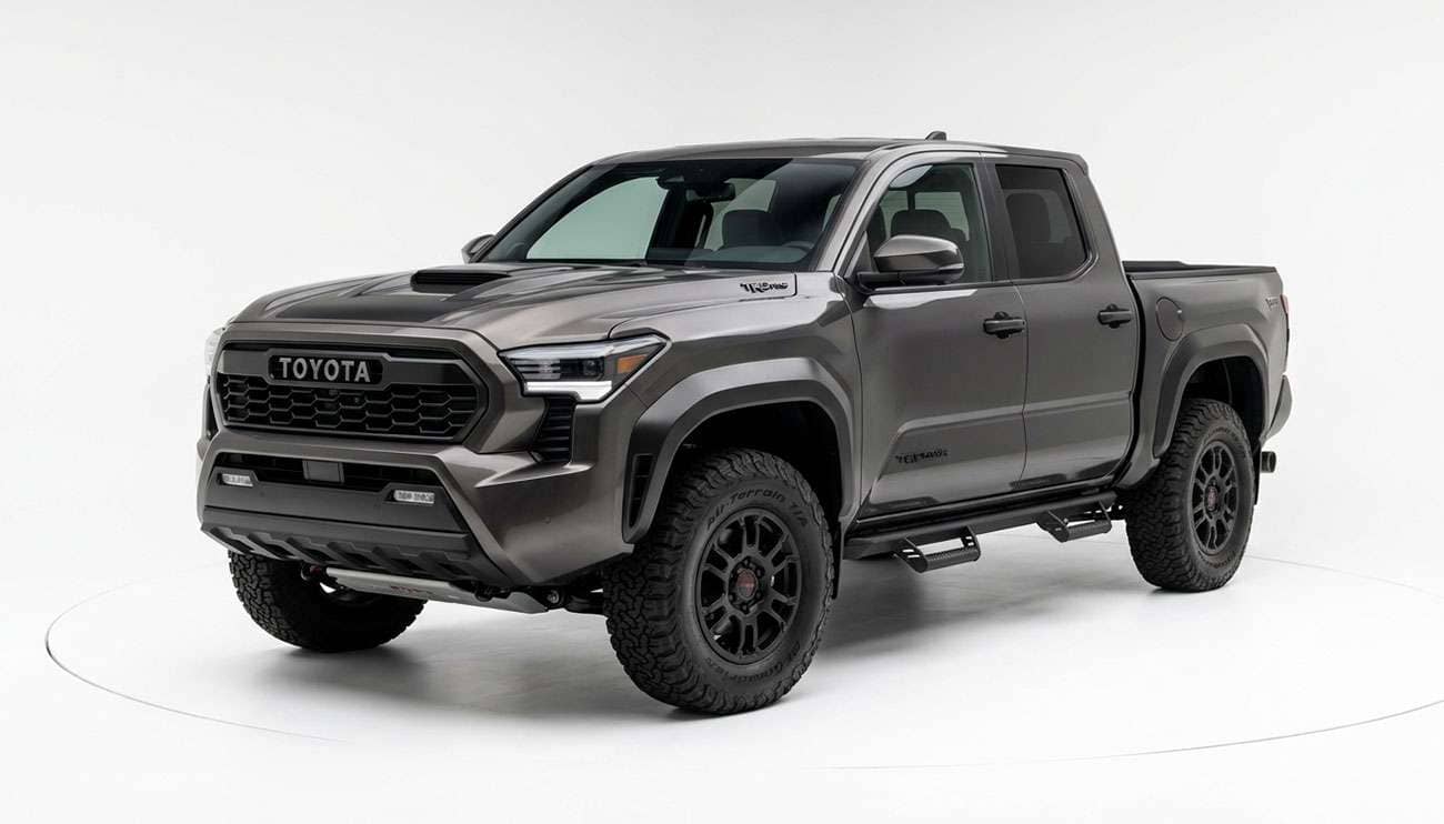 Modern midsize pickup truck with off-road alloy wheels on a clean white studio background