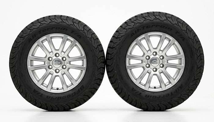 Comparison of a 70 series and 65 series truck tire showing the sidewall height difference