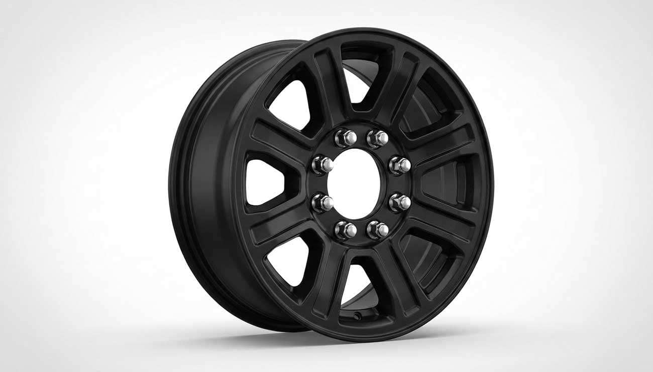 Ford Super Duty 8-lug wheel showing 8x170 bolt pattern with visible lug nuts arranged in a circle, black finish wheel.