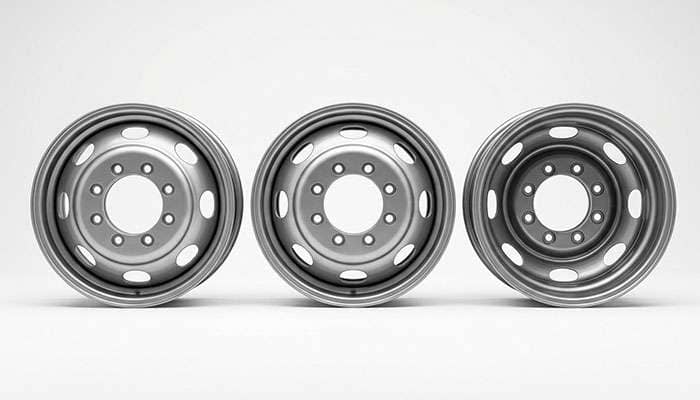 Three dually wheels arranged to show front, rear inner, and rear outer positions with visibly different mounting pad depths