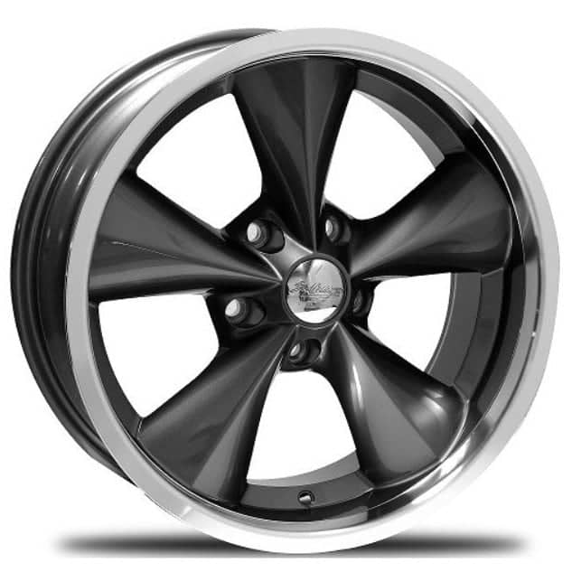 Boyd Coddington Junkyard Dog wheel in gunmetal on a clean white seamless studio backdrop