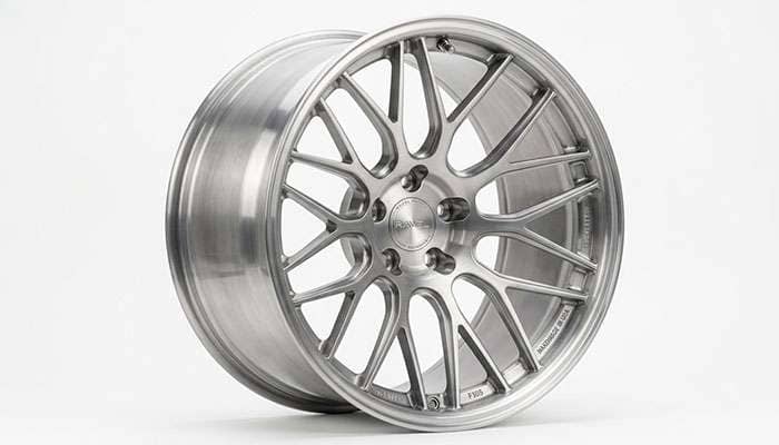 ADV.1 forged monoblock concave wheel close-up on a white studio backdrop