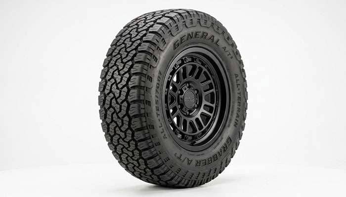 All-terrain tire showing aggressive tread blocks and reinforced sidewall