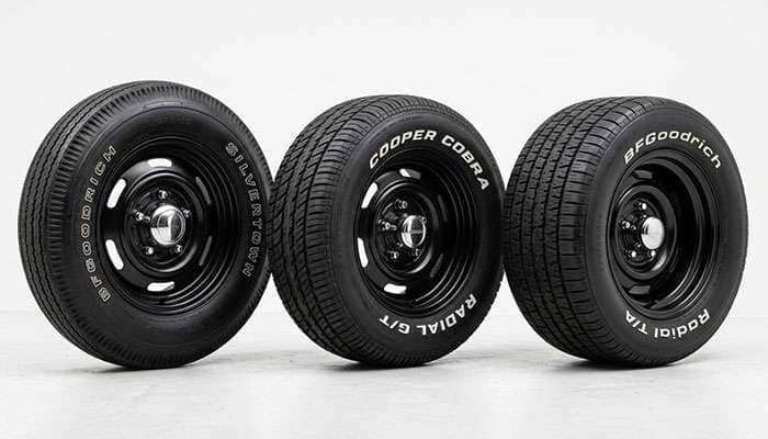 Three muscle car tires compared showing 60-series, 70-series, and 78-series sidewall heights on 15-inch wheels