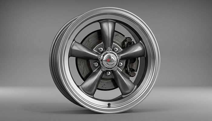 American Racing Torq Thrust five-spoke wheel detail showing polished spokes and machined lip