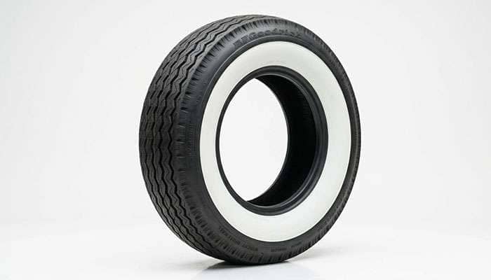 BFGoodrich Silvertown wide whitewall tire for classic car restoration on a clean studio backdrop