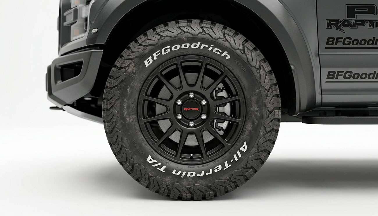 BFGoodrich All-Terrain tire mounted on a pickup truck against a clean studio backdrop