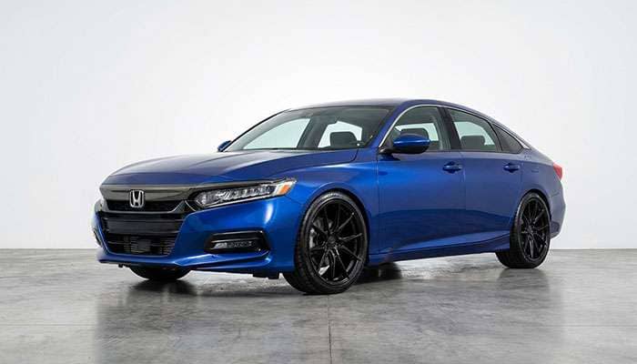 Blue 2017-2021 Honda Accord with aftermarket black wheels parked on pavement, showcasing fitment details
