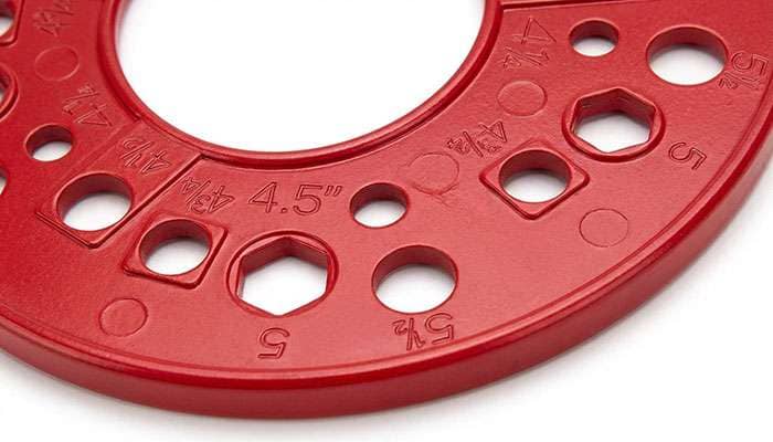 Red AOQIVIS wheel bolt pattern measuring tool with labeled hole sizes for 4.25, 4.75, 5, and 5.5 inch spacing