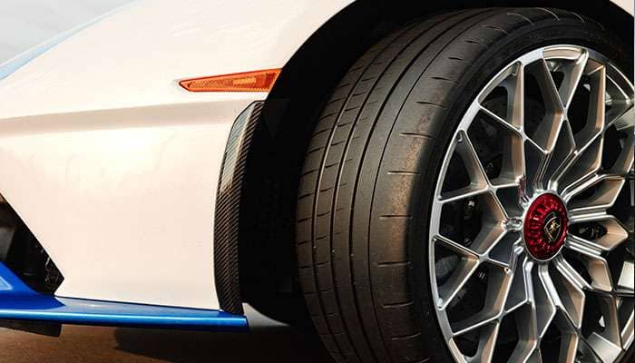 Bridgestone Potenza Race tire on performance vehicle at racetrack