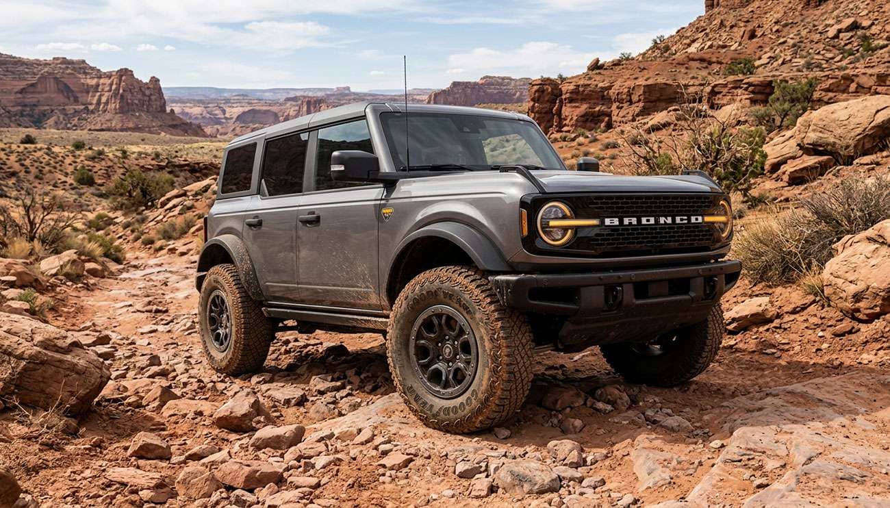 Ford Bronco Badlands without the Sasquatch package on 35-inch all-terrain tires on a rocky desert trail