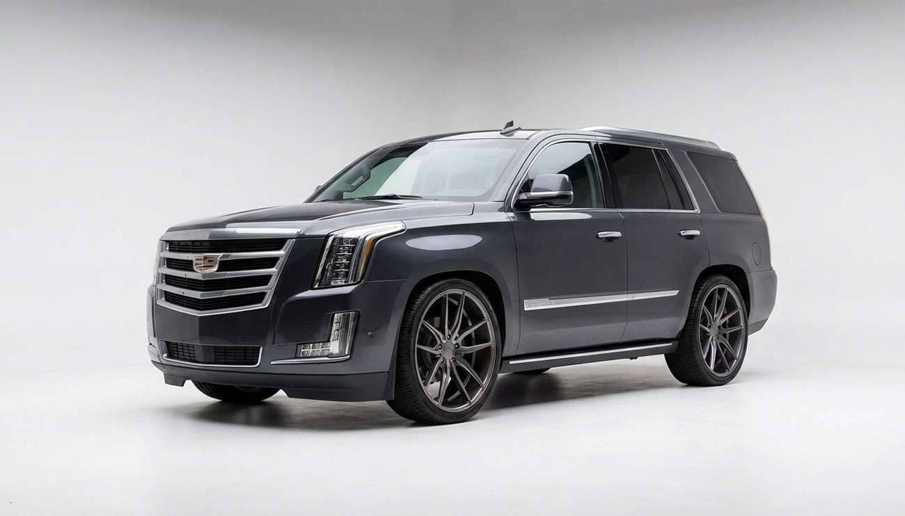 Cadillac Escalade with custom aftermarket wheels showcasing premium fitment and aggressive stance