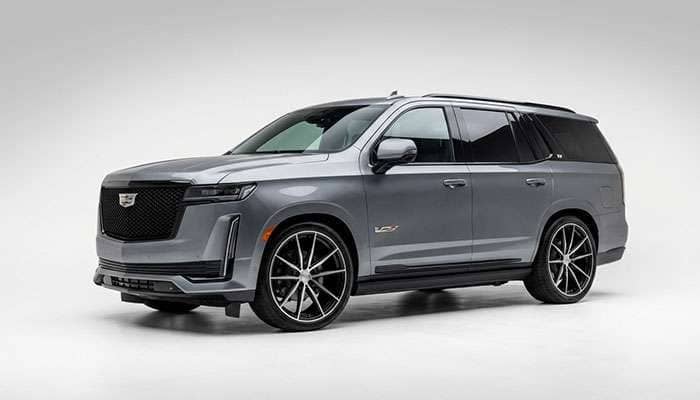 Black and silver forged wheel design displayed next to a gray Cadillac Escalade-V with matching wheels by Larte Design.