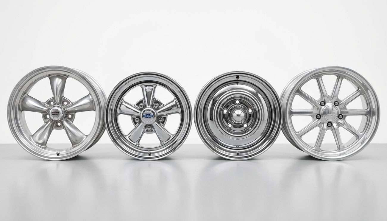 Row of classic truck aftermarket wheels showing different period-correct styles including chrome and polished finishes