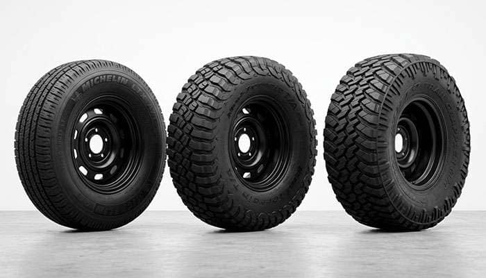 Three 33-inch light truck tires side by side showing narrow, medium, and wide tread widths