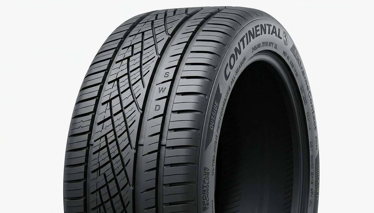 Continental ExtremeContact DWS06 Plus ultra-high-performance all-season tire with raised CONTINENTAL lettering and DWS tread indicators shown on a clean white seamless backdrop