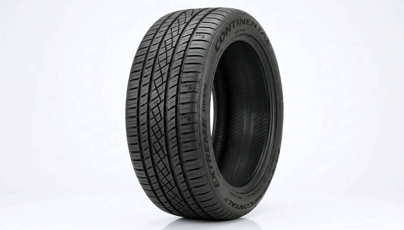 Continental ExtremeContact DWS06 Plus ultra-high performance all-season tire on a clean studio backdrop