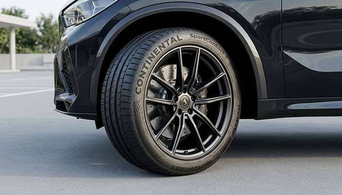 Continental SportContact 7 tire mounted on a large 22 inch wheel on a performance SUV