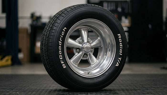 Side profile view of a deep dish wheel showing the dramatic lip depth between the mounting face and outer rim edge