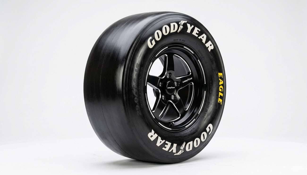 Drag racing slick tire with a smooth treadless surface