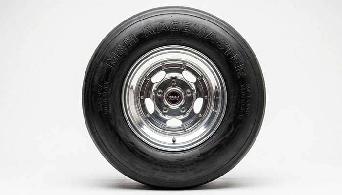 M and H Rear Drag Race Slick mounted on a wide drag wheel showing rim width and sidewall profile