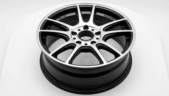 Touren TR3 3130 15x7 dual-drilled wheel with a hub-centric ring set in the center bore