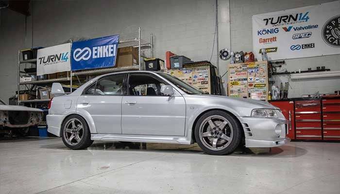 Enkei performance racing wheel showcasing lightweight aluminum construction and multi-spoke design