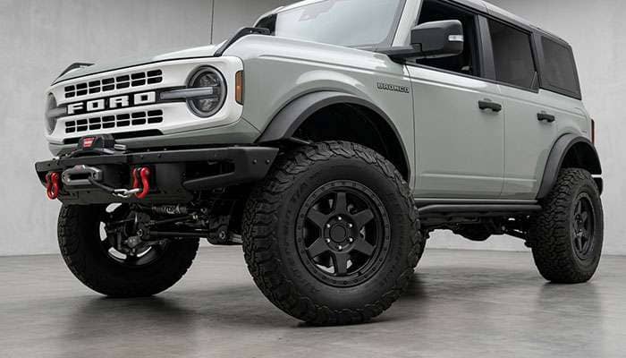 Fifteen52 Turbomac HD wheel mounted on a modern truck or 4Runner with overlanding setup showing the rally-derived design