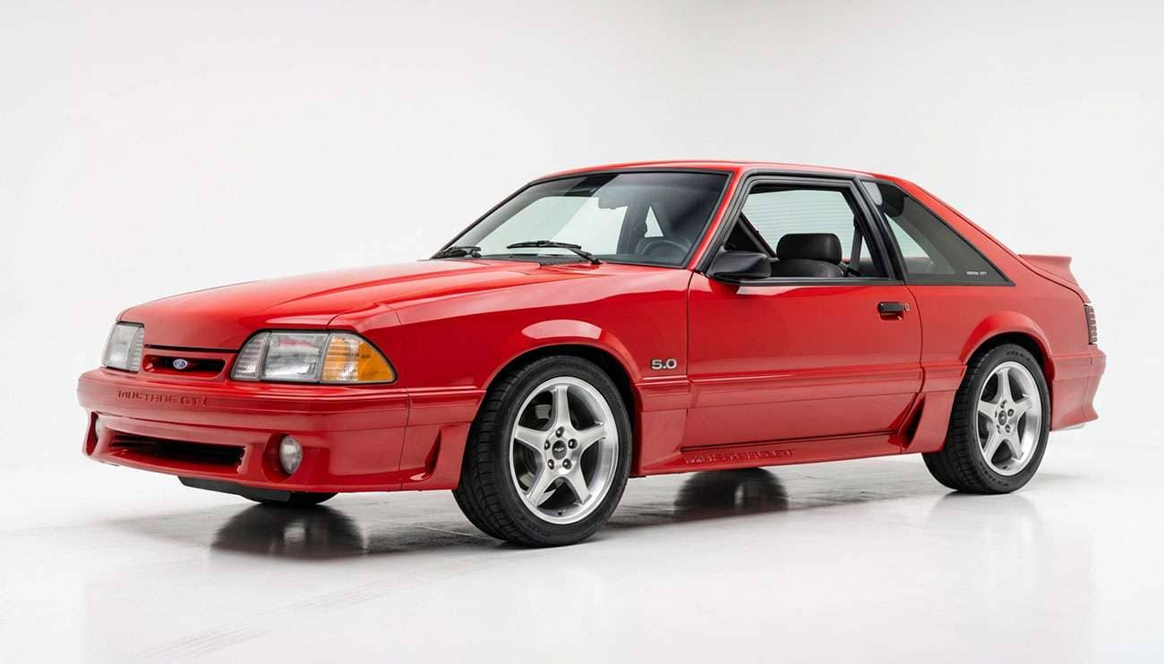 1990 Fox body Mustang GT hatchback on five-spoke 17-inch wheels after a 5-lug conversion