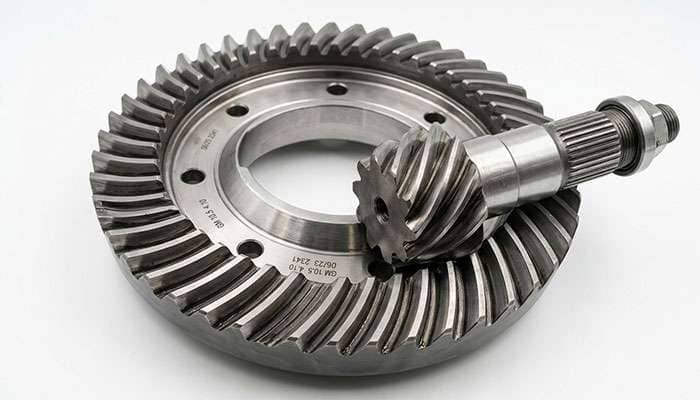 Ring and pinion gear set for a truck front differential showing the ring gear teeth and pinion
