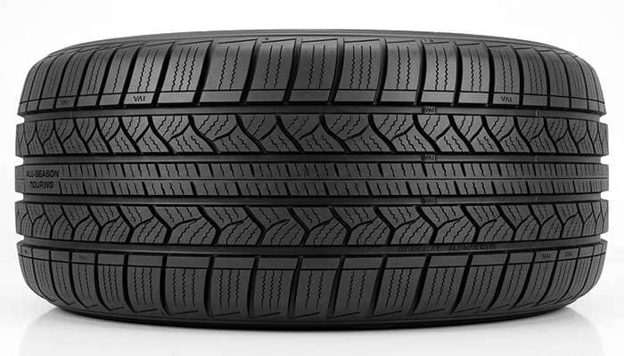 Overhead close-up of General AltiMAX RT45 tread showing molded replacement tire monitor lettering and visual alignment indicators