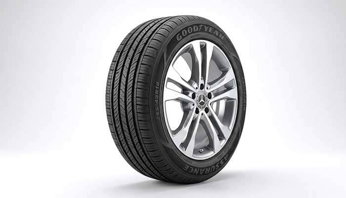 Close-up of a Goodyear Assurance MaxLife 2 tire mounted on a Mercedes-Benz vehicle wheel